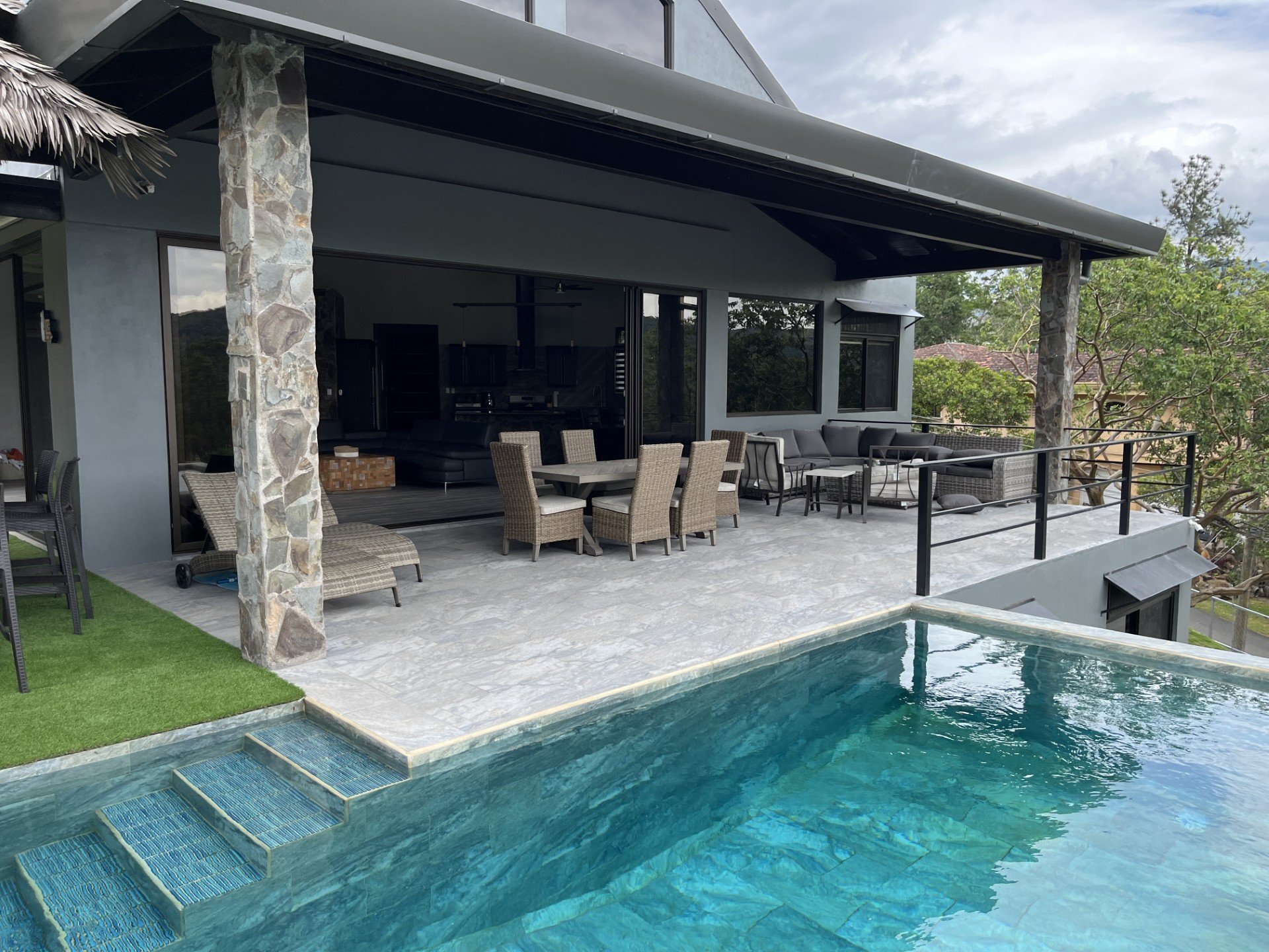 Pool and terrace with mountain views